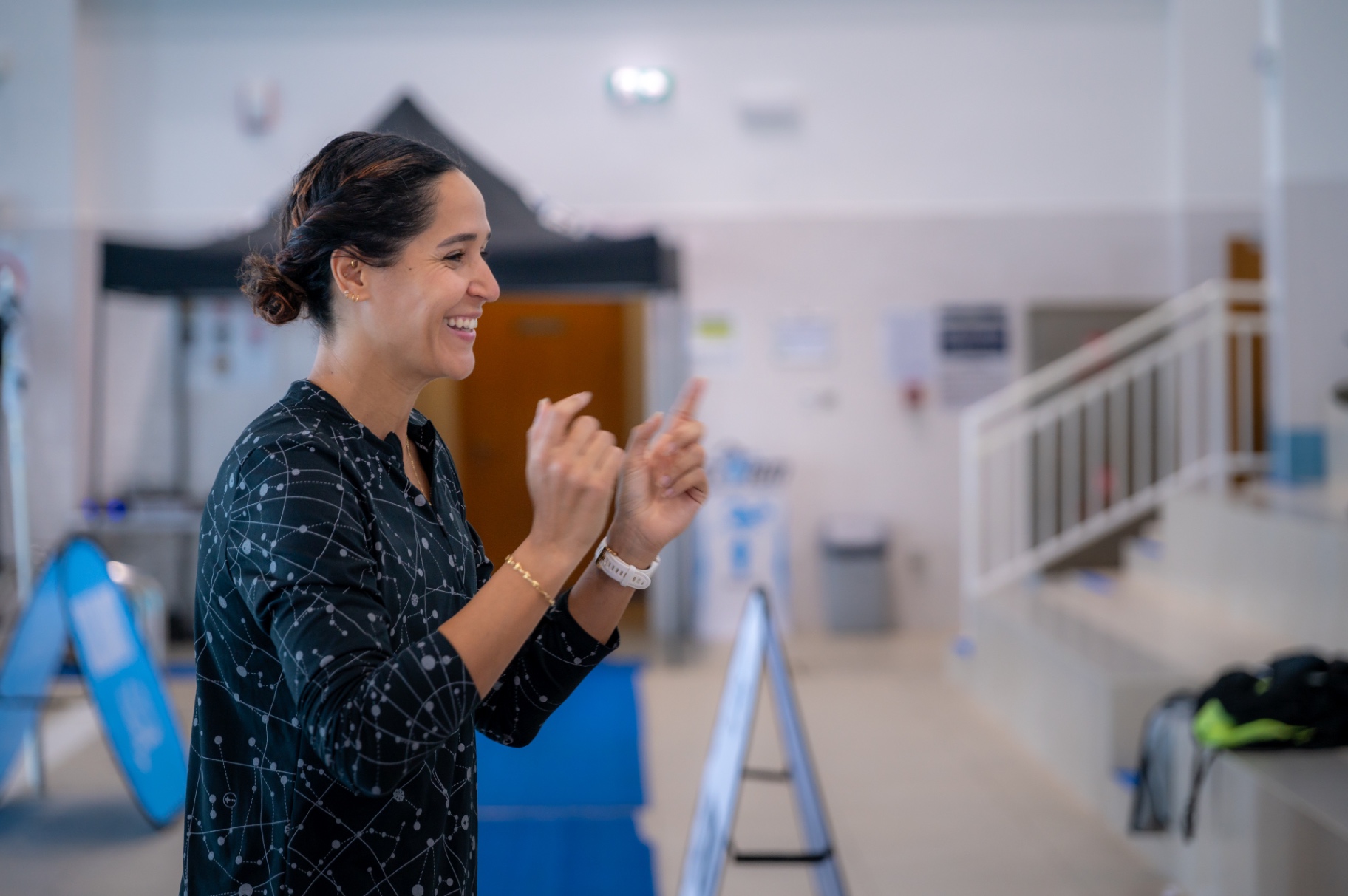 Dr Sarra Lajnef-Taylor laughing during a coaching session at Amity Abu Dhabi